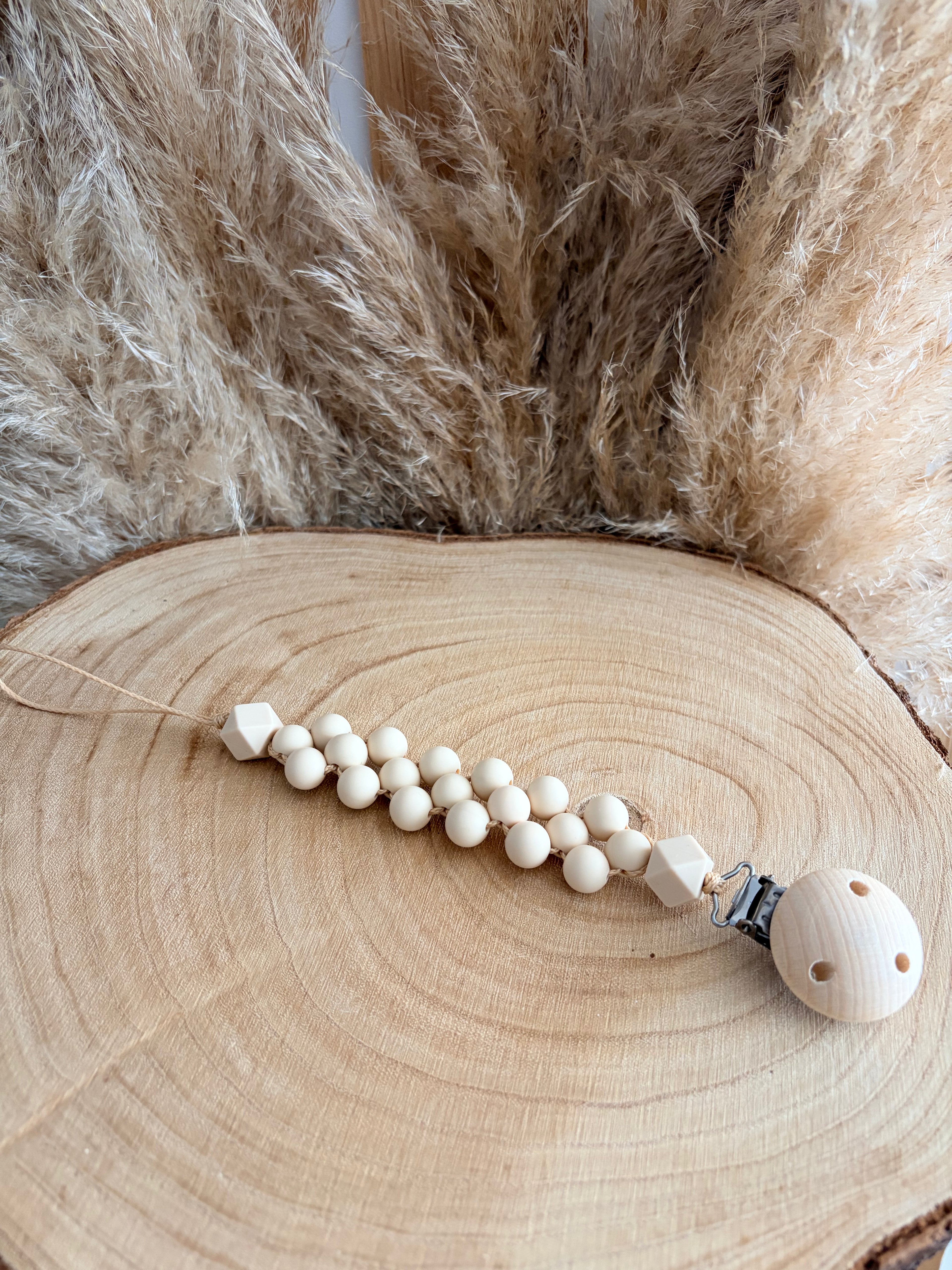 Attache tétine damier